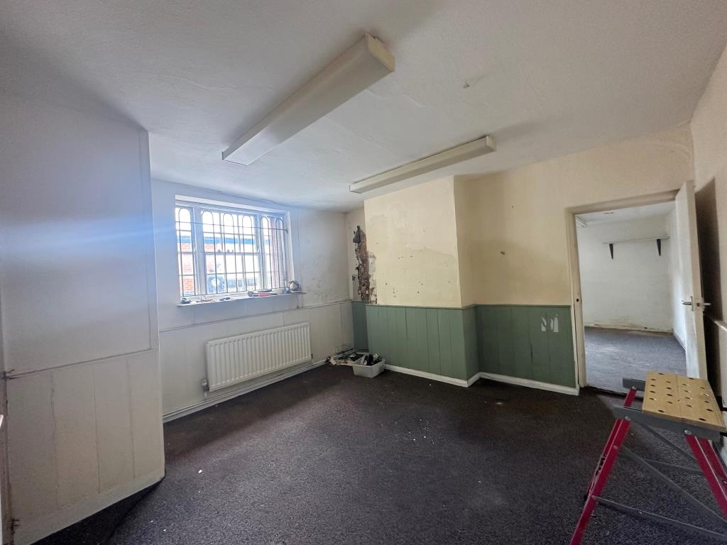 Lot: 8 - DETACHED PROPERTY FOR CONVERSION INTO FOUR-BEDROOM HOUSE - Room to rear on ground floor